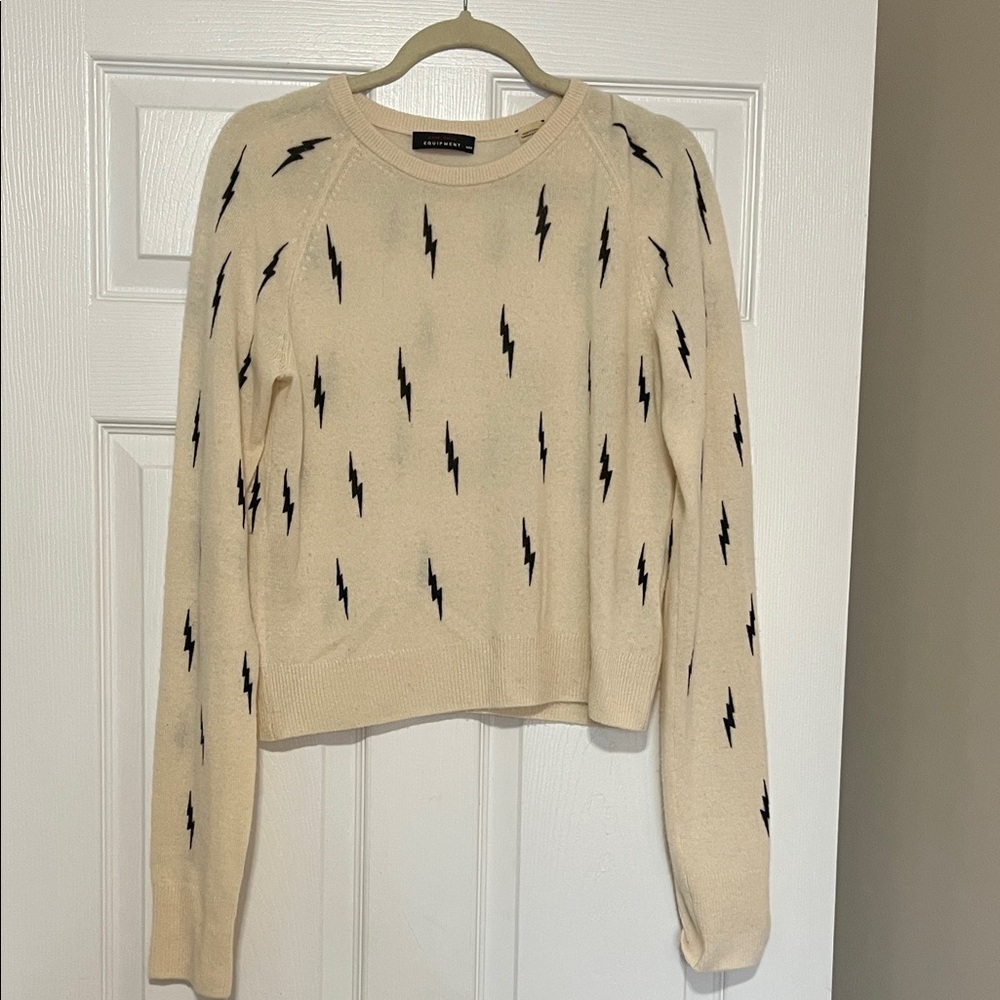 Kate Moss Equipment Cream Crewneck Sweater with Black Lightning Bolts